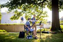In an open-air classroom, Tom Stark, a master’s student from Red Wing, Minnesota, plays the bassoo
