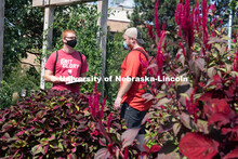 Travis Tank (right) and Brandon Mars discuss their observations of flowers in their herbaceous id cl