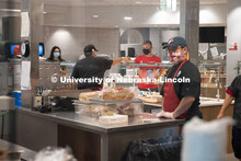 Kitchen staff prepare and give out meals in the newly renovated Dinning Center in the East Campus Un