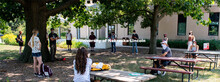 Students social distance and gather outside of Hardin Hall for the first day of in-person learning. 