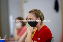 Kayla LaPoure listens to Anna Henson teach her Principles of Interactivity course in the Carson Cent