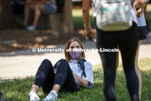 Annie Mimick talks with friends while she waits for her afternoon architecture class to begin. First