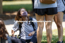 Annie Mimick talks with friends while she waits for her afternoon architecture class to begin. First