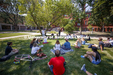 Steve Hardy teaches his Design Studio: Collaborate course outside Architecture Hall on the first day