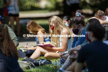 Students take notes as Steve Hardy teaches his Design Studio: Collaborate course outside Architectur