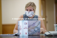 A young woman studies in the College of Business. First day for in-person learning for the fall seme