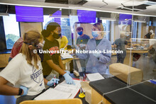 Chemistry Lab Teaching Assistant, Sarah Brady answers questions in the Chemistry 105 lab. First day 