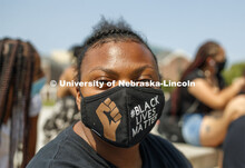 Dominique Liu-Sang wears a Black Lives Matter mask at the sit-in sponsored by the Black Student Unio