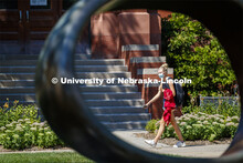 Erin Brandvik, freshman from Woodbury, MN, is framed by the Fragment X-O sculpture in the Sheldon Sc