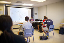 Associate Professor, Josh Brummer livens up his Math 309 class by teaching in a Hawaiian shirt and c