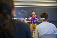 Associate Professor, Josh Brummer livens up his Math 309 class by teaching in a Hawaiian shirt and c
