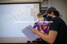 Associate Professor, Josh Brummer livens up his Math 309 class by teaching in a Hawaiian shirt and c