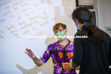 Associate Professor, Josh Brummer livens up his Math 309 class by teaching in a Hawaiian shirt and c