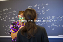 Associate Professor, Josh Brummer livens up his Math 309 class by teaching in a Hawaiian shirt and c