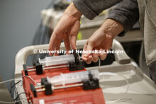 Automatic syringes pump both the milkshake and a tasteless rinse in small quantities to the research
