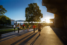 A sunrise serenade as the cymbals and bass line of the Cornhusker Marching Band practices outside Ki