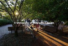 The bass line practices under the trees outside the Lied Center. A sunrise serenade as the cymbals a