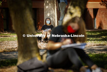 Moe Oo, freshman from Omaha, sketches the scene in front of her. Chip Stanley's DSGN120 Design Drawi