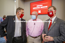 UNL Chancellor Ronnie Green talks with United States Secretary of Agriculture Sonny Perdue and NU Pr