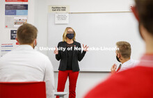 Shari Veil, CoJMC dean, talks with student ambassadors during an early morning meeting in Andersen H