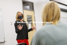 Shari Veil, CoJMC dean, talks with student ambassadors during an early morning meeting in Andersen H