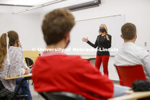 Shari Veil, CoJMC dean, talks with student ambassadors during an early morning meeting in Andersen H