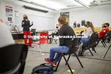 Shari Veil, CoJMC dean, talks with student ambassadors during an early morning meeting in Andersen H