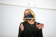 Shari Veil, CoJMC dean, talks with student ambassadors during an early morning meeting in Andersen H