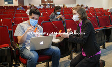 Rebecca Roston (right), associate professor of biochemistry, with Alex Teano to help him visualize h