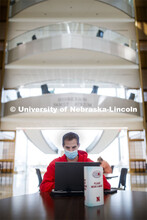 Mark Quinn studies in the foyer of the College of Business. September 14, 2020. 