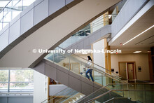 A young woman walking up the stairs in Hawks Hall. September 14, 2020. 