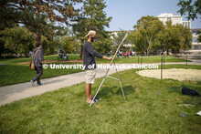 Saeed Almahrooqi works on his drawing for Chip Stanley's DSGN120 Design Drawing class. Outdoor class