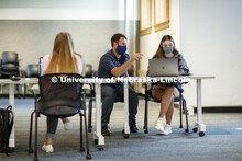 Teaching Assistant Phillip Smith helps Emily Francis, right, (first year, pre-interior design studen