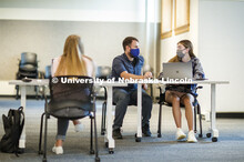 Teaching Assistant Phillip Smith helps Emily Francis, right, (first year, pre-interior design studen