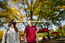 Brooklyn Guess, left, and Nicole Marienau walk through the plaza outside the Nebraska Union while we