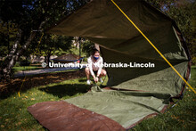 Kelsey Belgum ties down her structure in Sharon Kuska's ARCH 231 - Structural Fundamentals class. St