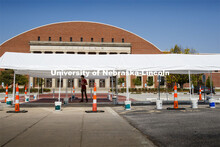 Calib Kirilov, sophomore from Omaha, rolls down the sidewalk on his skateboard under the newly erect