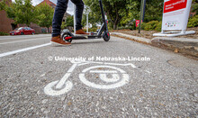 Scooters park in a designated area south of Love Library. September 28, 2020. 