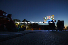 Attendees sat outside their cars and in socially distanced lawn chairs to watch “The Art of Dissen