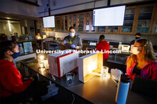 Daniel Gutzmann, Graduate Teaching Assistant in biological sciences, demonstrates taking samples fro