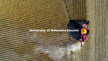 A combine works through a soybean field west of Firth, NE. Fall Harvest. October 6, 2020. 