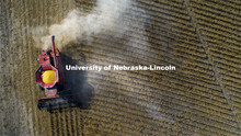 A combine works through a soybean field west of Firth, NE. Fall Harvest. October 6, 2020. 