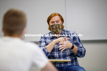 Tyler White, associate professor of practice in political science, teaches his Introduction to Natio