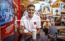 Students enjoy ice cream while social distancing inside the Dairy Store. East Campus photo shoot. Oc