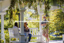 Students enjoy the afternoon on Perin Porch on east campus. East Campus photo shoot. October 13, 202