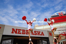 Cornhusker Marching Band, Cheer Squad and Homecoming Royalty met in the empty Memorial Stadium to re
