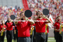 Cornhusker Marching Band, Cheer Squad and Homecoming Royalty met in the empty Memorial Stadium to re