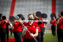 Cornhusker Marching Band, Cheer Squad and Homecoming Royalty met in the empty Memorial Stadium to re