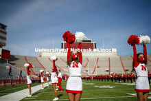 Cornhusker Marching Band, Cheer Squad and Homecoming Royalty met in the empty Memorial Stadium to re