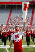 Cornhusker Marching Band, Cheer Squad and Homecoming Royalty met in the empty Memorial Stadium to re